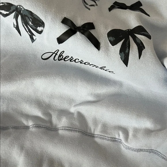 Abercrombie Kids Light Blue Hoodie with Black Bow Design 13/14 - Picture 4 of 5